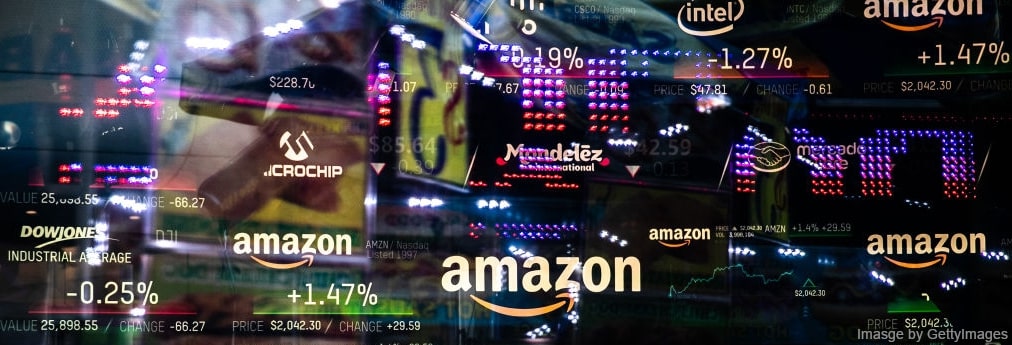Screen showing logos of Amazon, Dowjones, and Amazon with a rates of stocks and charts
