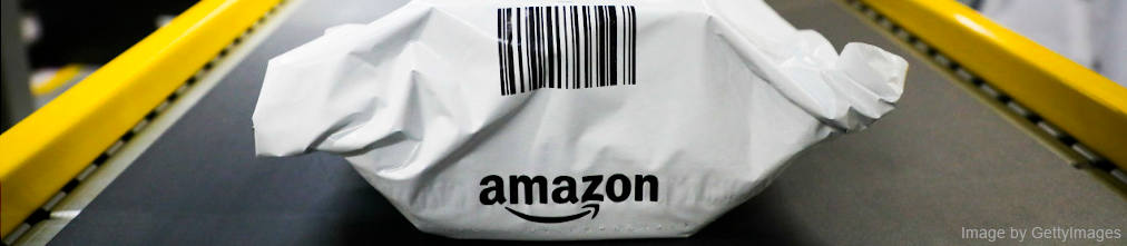 Package with Amazon logo and barcode on transporter tape at a fulfillment center