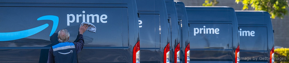 Amazon employee cleaning van with Amazon Prime logo